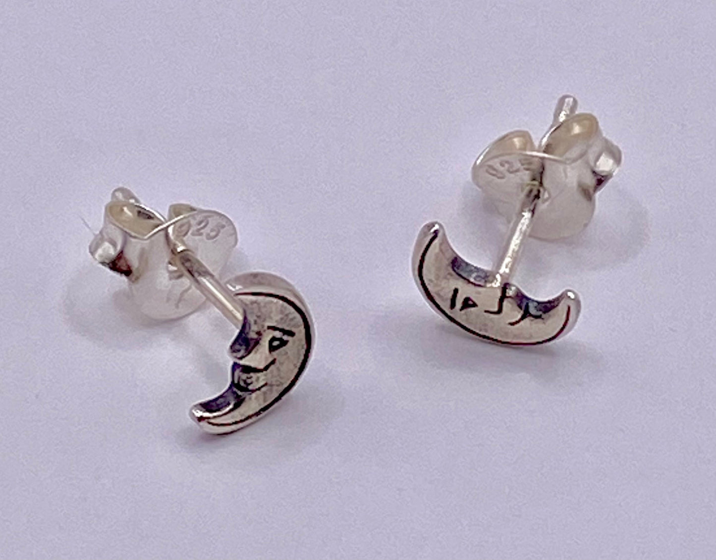 Tiny Crescent Moon Earrings in Sterling Silver
